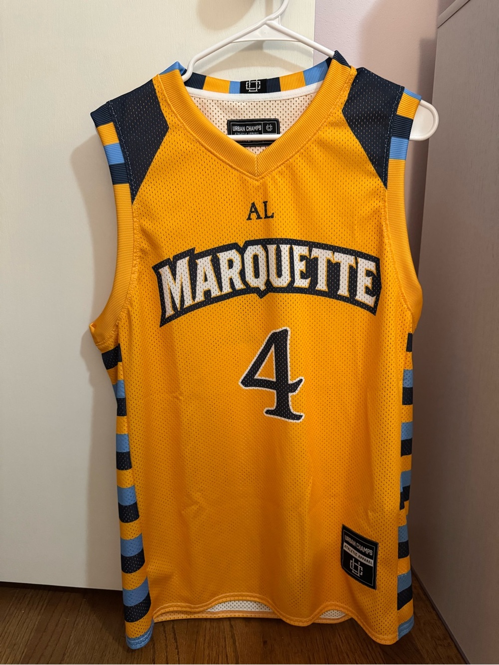 Marquette #4 Gold Basketball Jersey